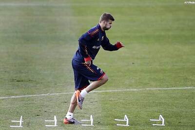 Pique happy to avoid Brazil in next round