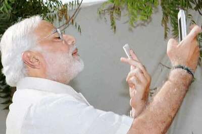 Gujarat HC admits plea against Modi for defying poll code of conduct, clicking selfie with BJP's lotus