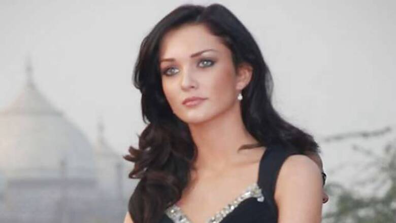 Actor Amy Jackson adopts a dolphin on her birthday