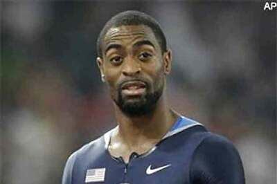 Sprinter Tyson Gay fails dope test, pulls out of world championships