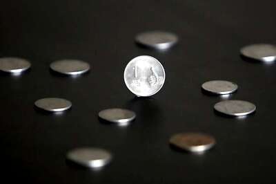 Rupee down 16 paise against dollar in early trade