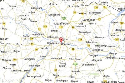 Smuggler arrested, huge cache of arms seized