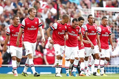 Arsenal striving for top spot in Champions League