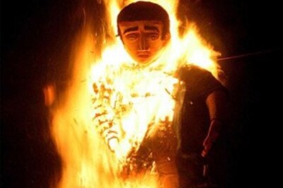 Kasab reading Mahatma Gandhi's autobiography