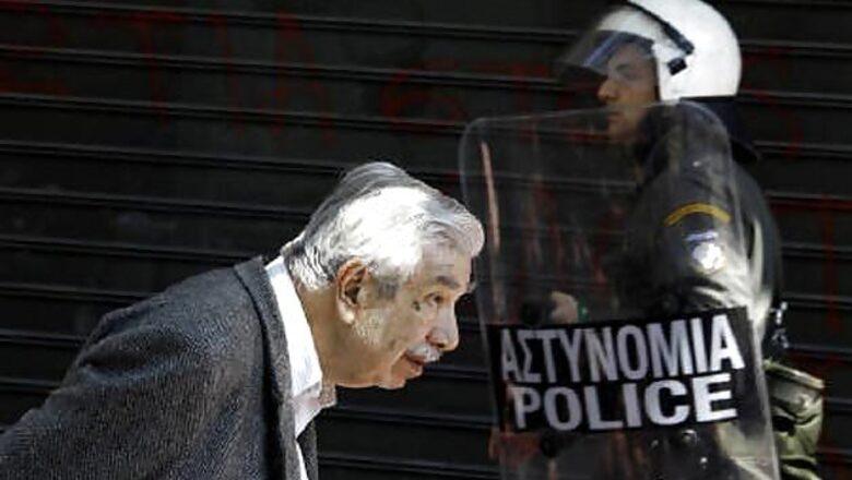 Greece downgraded, deficit worse than feared