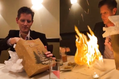 Watch: Trying To Unwrap Christmas Presents, Man Sets Restaurant Table On Fire