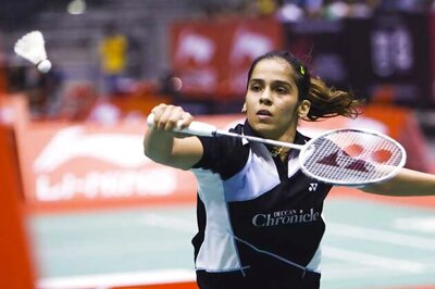 Saina sails into QFs, injured Kashyap crashes out