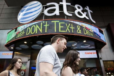 Kaine, Trump, U.S. Lawmakers Raise Concerns Over AT&T-Time Warner Deal
