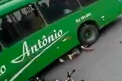In Brazil, Helmet Saves Biker's Life As He Slips Under The Bus; Watch Video
