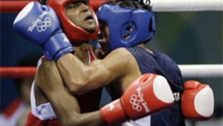 Pugilist Lakra knocked out of Olympics