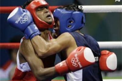 Pugilist Lakra knocked out of Olympics