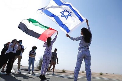 Model Diplomacy: Israeli Waves Flag In UAE Pajama Photoshoot