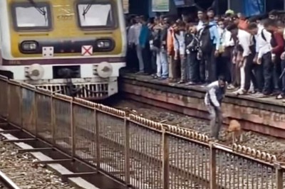 Spirit of Mumbai: Man Saves Dog on Railway Track as Train Approaches